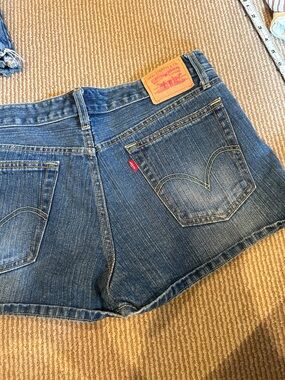 Levi's Women's Medium Blue Denim Cutoff Shorts with Signature Red Tab size 32